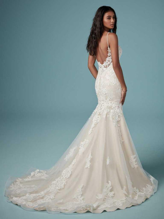 Dress: 2801 Maggie Sottero “Glorietta” Waist: 28