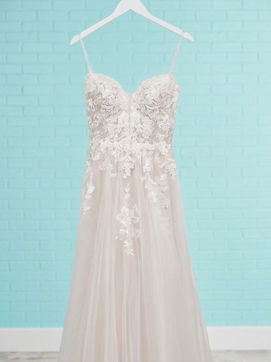 Dress: 3114 Maggie Sottero “Stevie” Waist: 31