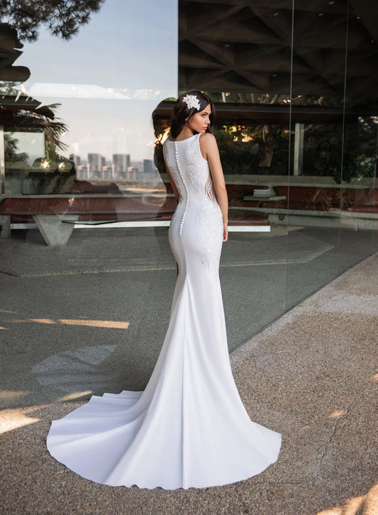 Dress: 3306 Pronovias “Kelly” Waist: 33