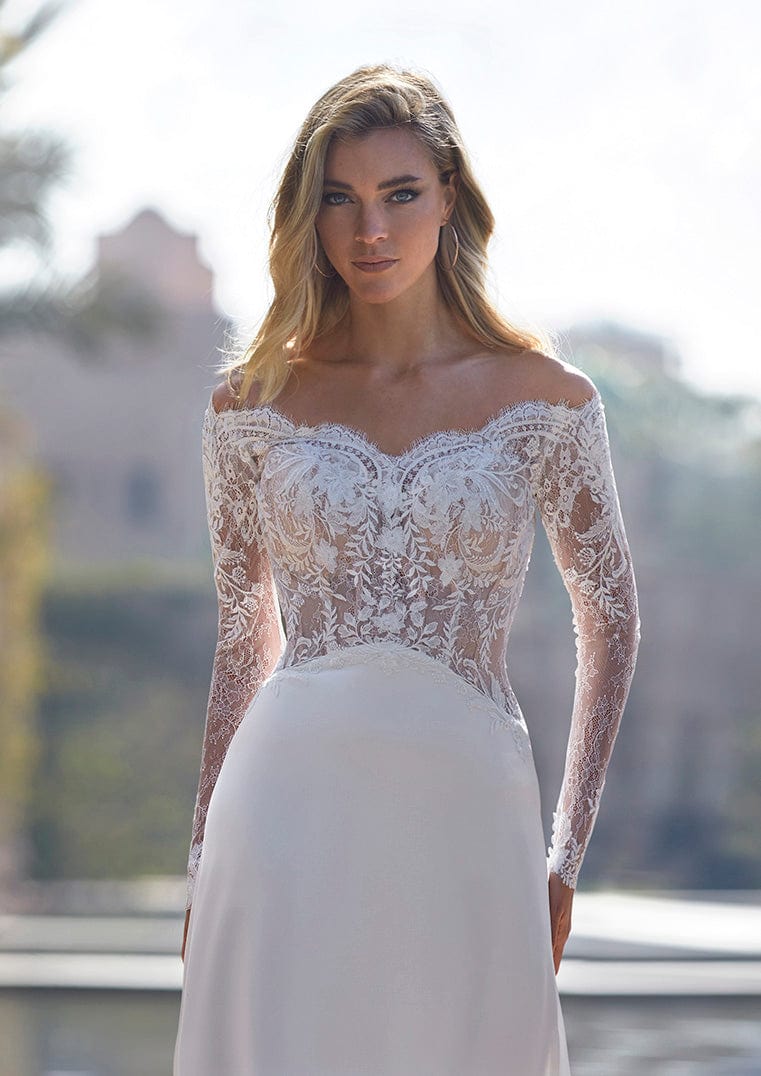 Dress: 3301 Pronovias "Brigitta" Waist: 33