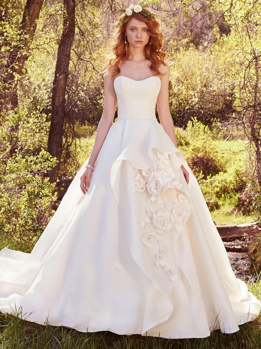 Dress: 2734 Maggie Sottero “Bianca” Waist: 27