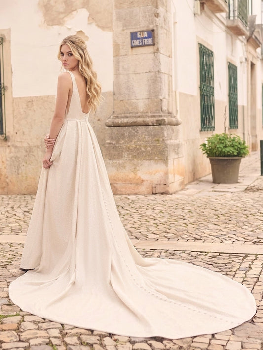 Dress: 3101 Maggie Sottero “Nolan” Waist: 31