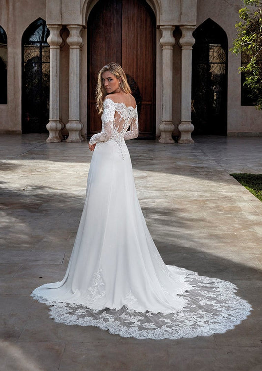 Dress: 3301 Pronovias "Brigitta" Waist: 33