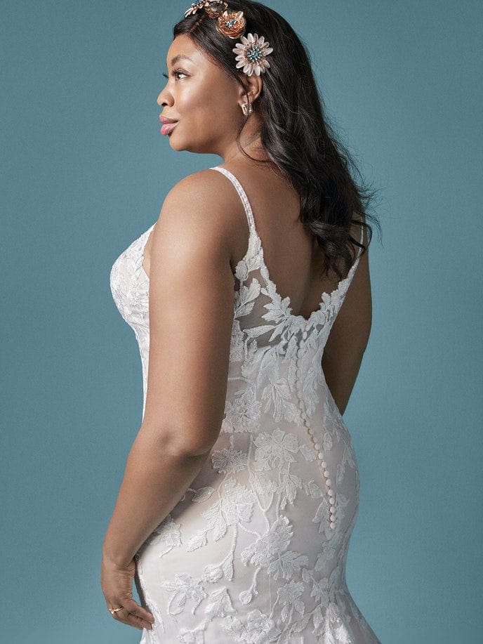 Dress: 3301 Maggie Sottero “Giana Lynette” Waist: 33