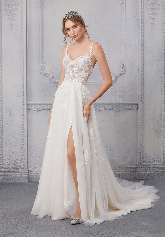 Dress: 2809 Morilee Blu “Cipriana” Waist: 28