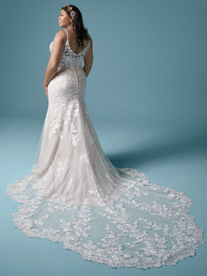 Dress: 3301 Maggie Sottero “Giana Lynette” Waist: 33