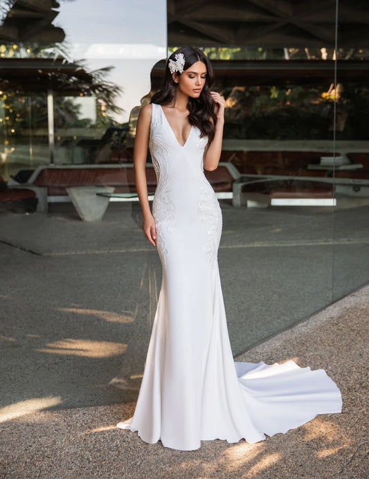 Dress: 3306 Pronovias “Kelly” Waist: 33