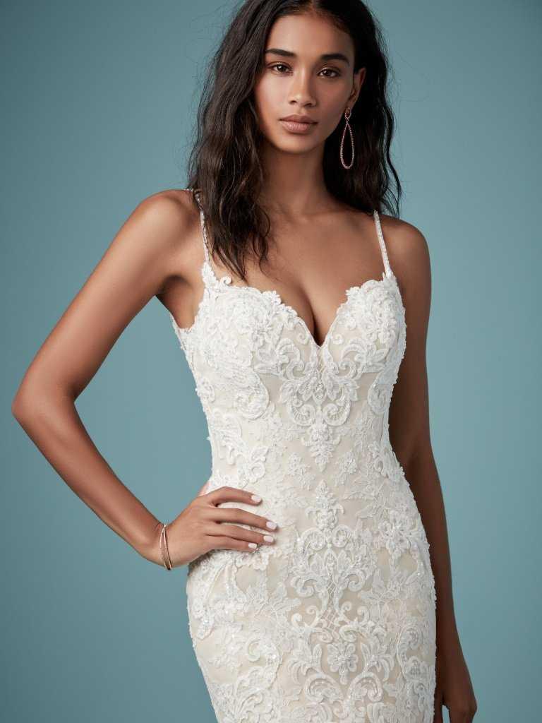 Dress: 2801 Maggie Sottero “Glorietta” Waist: 28