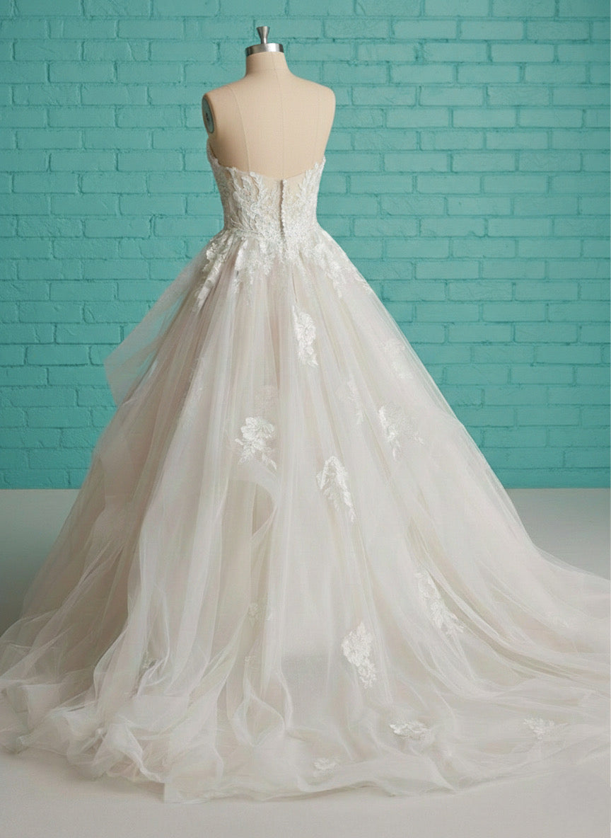 New Dress: 2069 Maggie Sottero “Indiana” Waist: 31