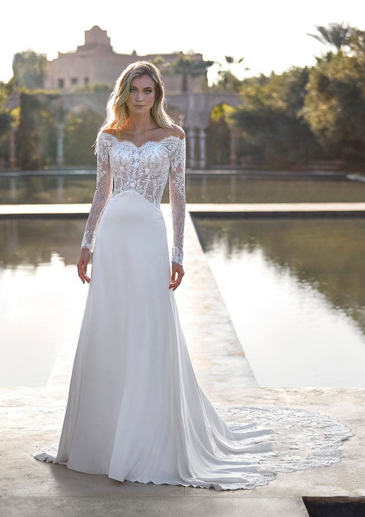 Dress: 3301 Pronovias "Brigitta" Waist: 33