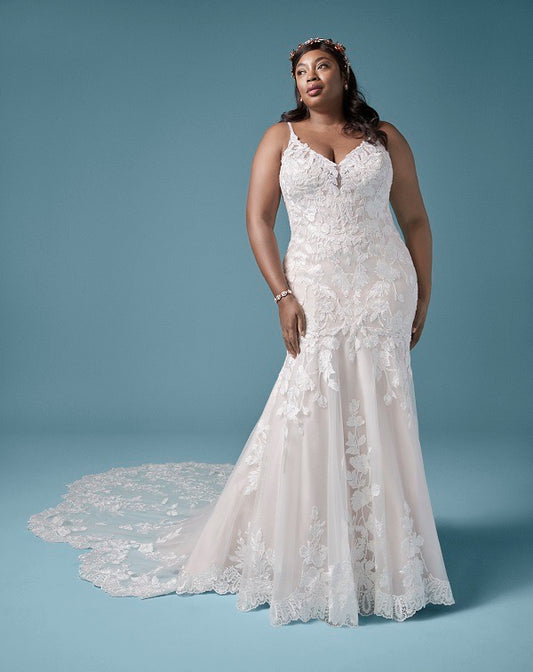 Dress: 3301 Maggie Sottero “Giana Lynette” Waist: 33