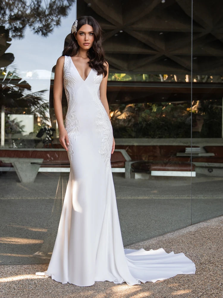 Dress: 3306 Pronovias “Kelly” Waist: 33