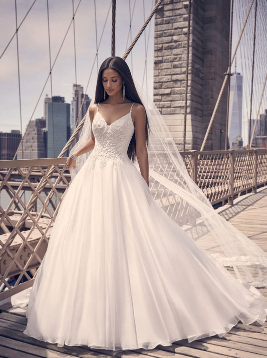 Dress: 2918 Maggie Sottero “Fairbanks” Waist: 29