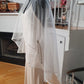 VC9: Silk organza veil cape with crystal details at neck and arm holes