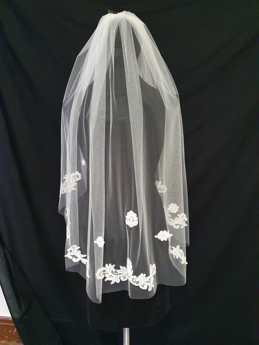 Veil 200: Fingertip light ivory veils with custom applique