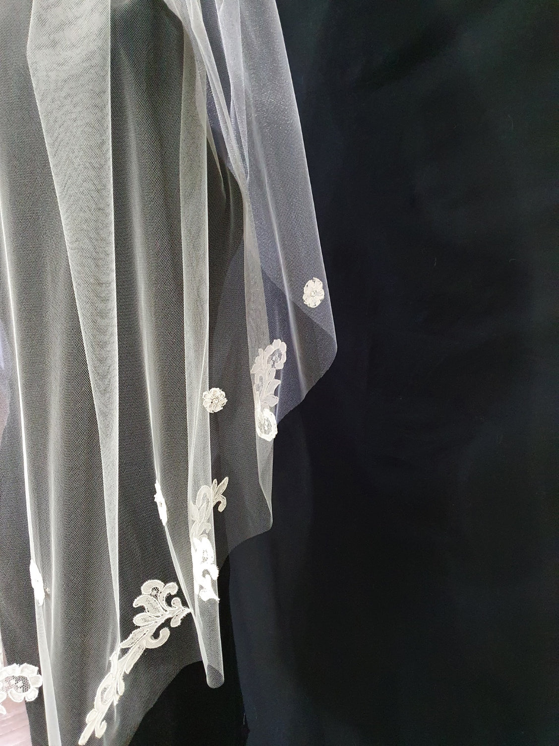 Veil 200: Fingertip light ivory veils with custom applique
